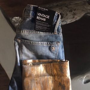 Black orchid jeans with gold finish at the bottom